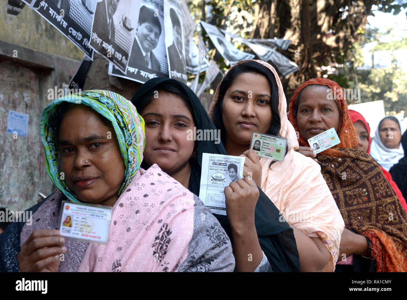 Dhaka, Bangladesh. 30th Dec, 2018. Voters line up at a polling station in Dhaka, Bangladesh, Dec. 30, 2018. Nationwide voting opened Sunday morning in Bangladesh's general elections to elect hundreds of representatives to parliament amid reports of stray violence. Credit: Salim Reza/Xinhua/Alamy Live News Credit: Xinhua/Alamy Live News Stock Photo
