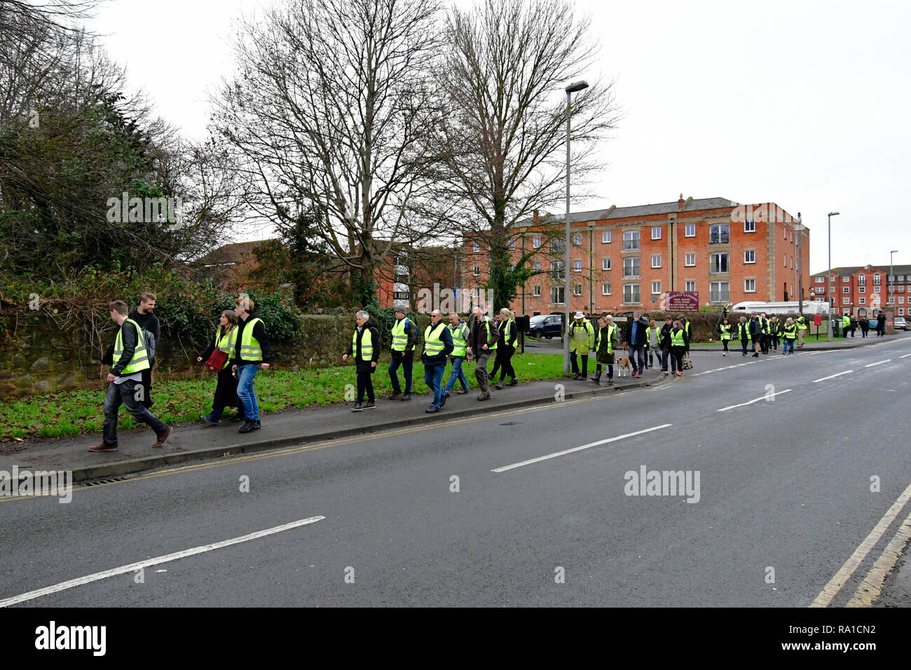 Bridgewater, Somerset, UK. 30th December 2018. UK in Bridgewater Yellow Vest protesters take to the streets and march from Bridgewater Docks to Sedgemoor District Councl office Bridgewater House in King's Square,in protests over local Councillors High Expenses and how things are run. Credit: Robert Timoney/Alamy Live News Stock Photo