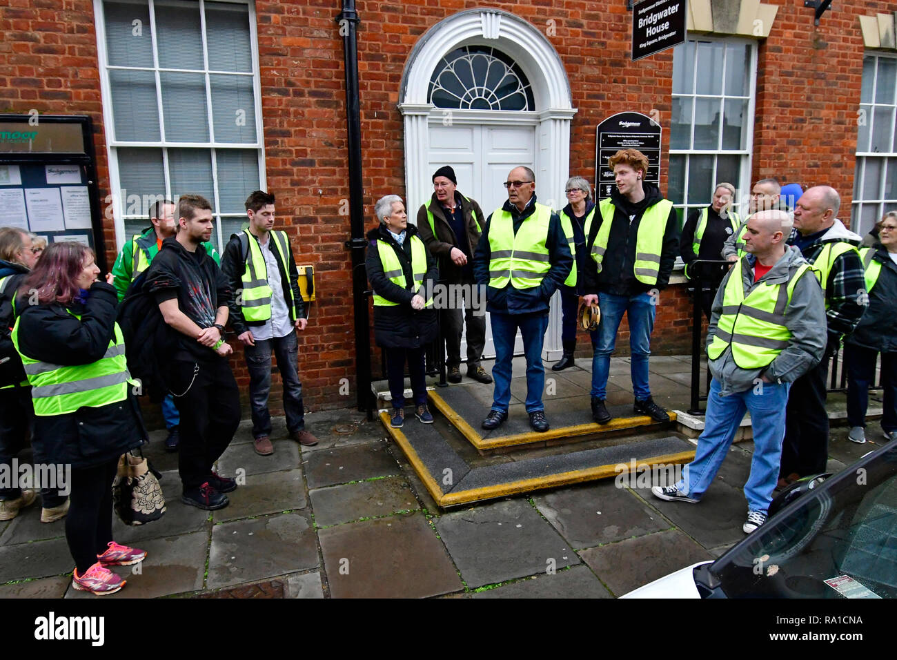 Bridgewater, Somerset, UK. 30th December 2018. UK in Bridgewater Yellow Vest protesters take to the streets and march from Bridgewater Docks to Sedgemoor District Council office Bridgewater House in King's Square, protests over local Councillors High Expenses and how things are run. Credit: Robert Timoney/Alamy Live News Stock Photo
