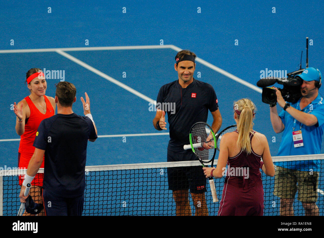RAC Arena, Perth, Australia. 30th Dec, 2018. Hopman Cup Tennis, sponsored  by Mastercard; Cameron Norrie and Katie Boulter of Team Britain  congratulate Roger Federer and Belinda Bencic of Team Switzerland after they