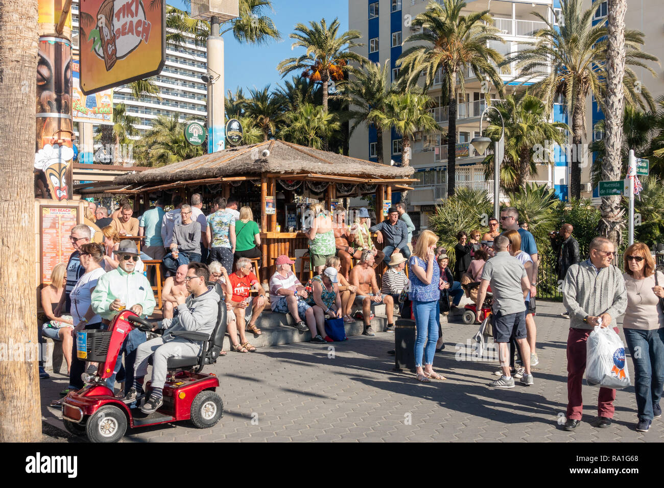 Benidorm, Spain. 30 December 2018. British tourists mix with locals on the beaches and in the bars and restaurants as they escape the cold British weather and head south to Spain. High temperatures meant that the beaches were busy from early morning with families enjoying the calm sea and temps of about 17 Celsius. Hotel occupancy is 90% for the Christmas and New Year period in this popular Spanish resort. Credit: Mick Flynn/Alamy Live News Stock Photo