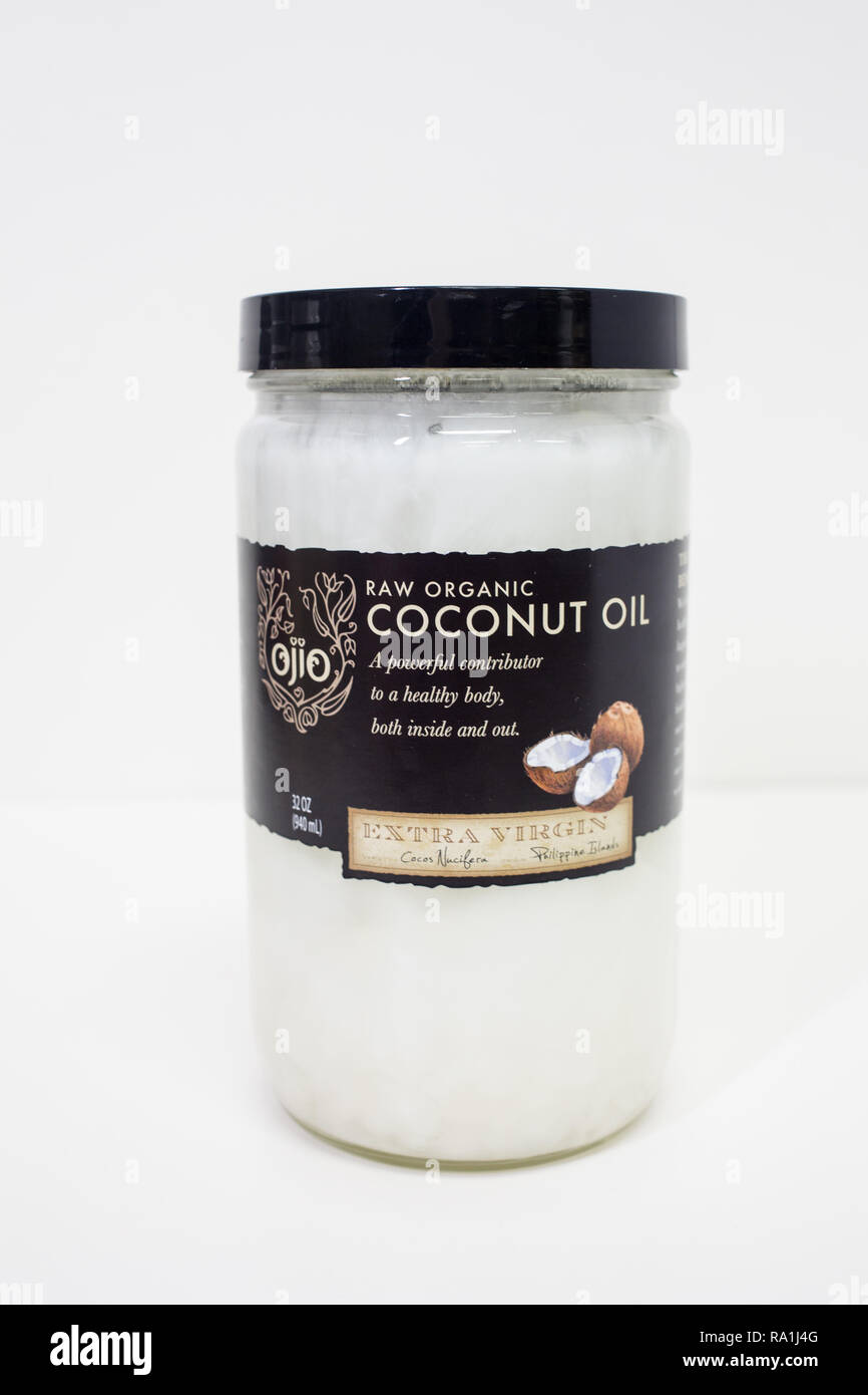 Coconut Oil in a Jar on White Stock Photo Alamy
