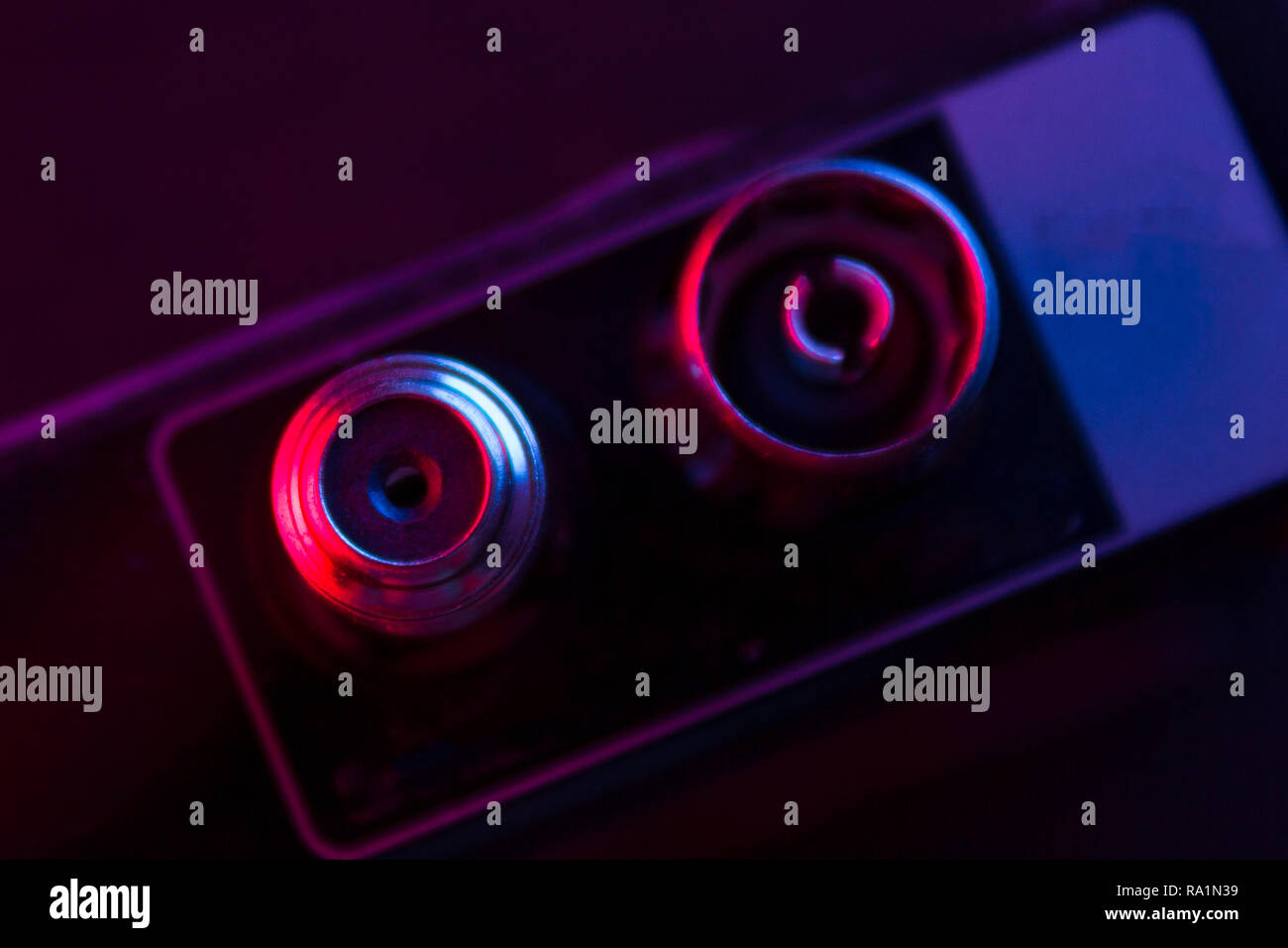 close up of some electronic stuff in neon light Stock Photo