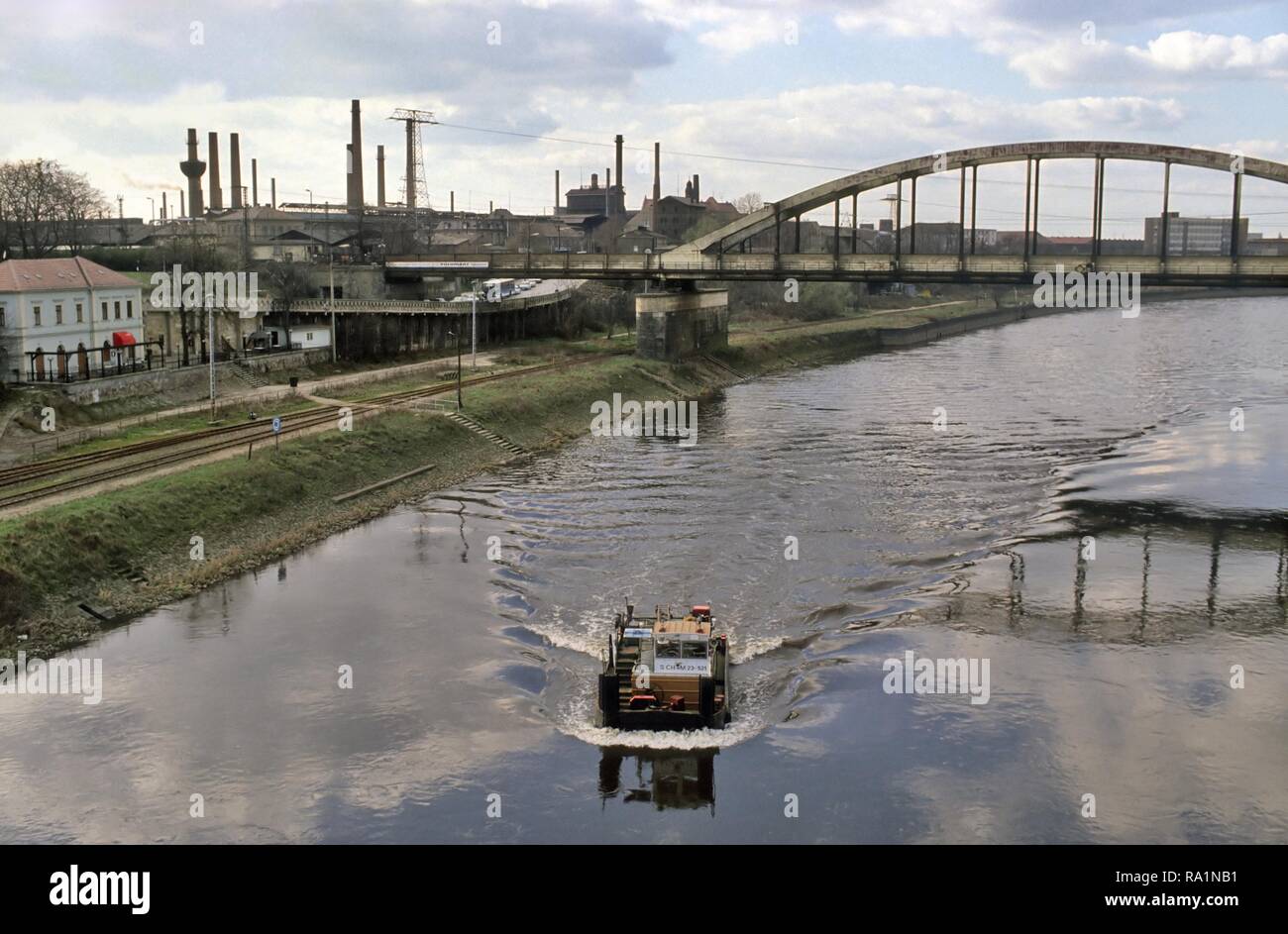 Germany, industrial area and river Elbe in the city of Riesa immediately after the reunification between DDR and the Federal Republic of Germany (March 1991) Stock Photo