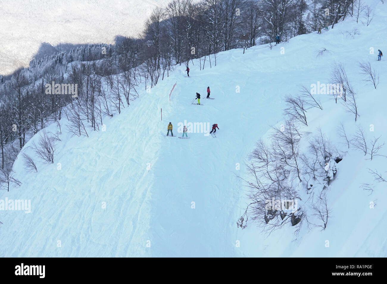 Snowboarders ride down ski slope hi-res stock photography and images ...