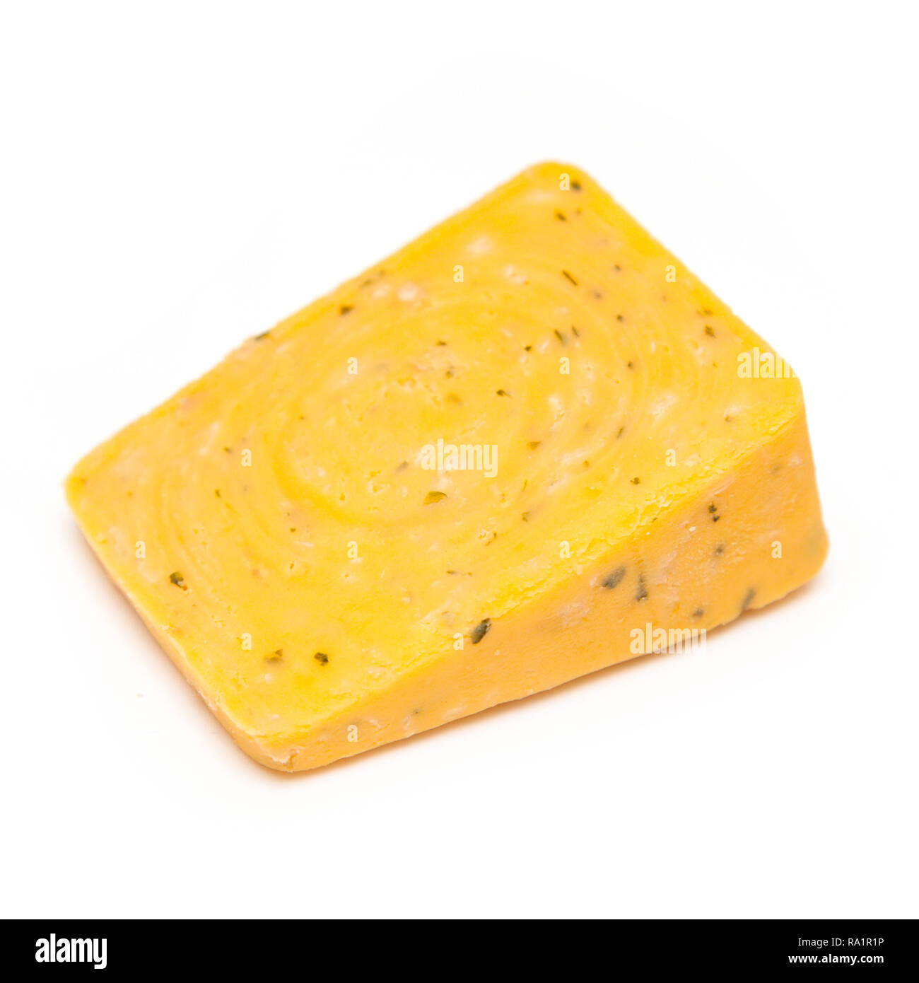Double Gloucester cheese with onions and chives isolated on a white studio background. Stock Photo