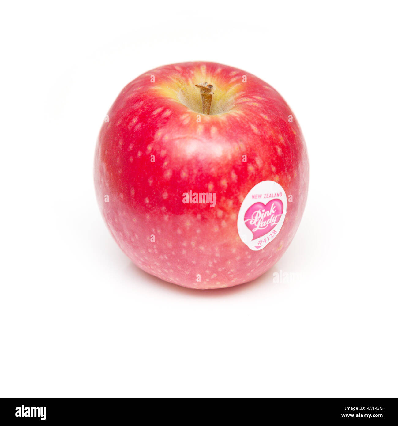 Pink Lady apple isolated on a white studio background. Stock Photo