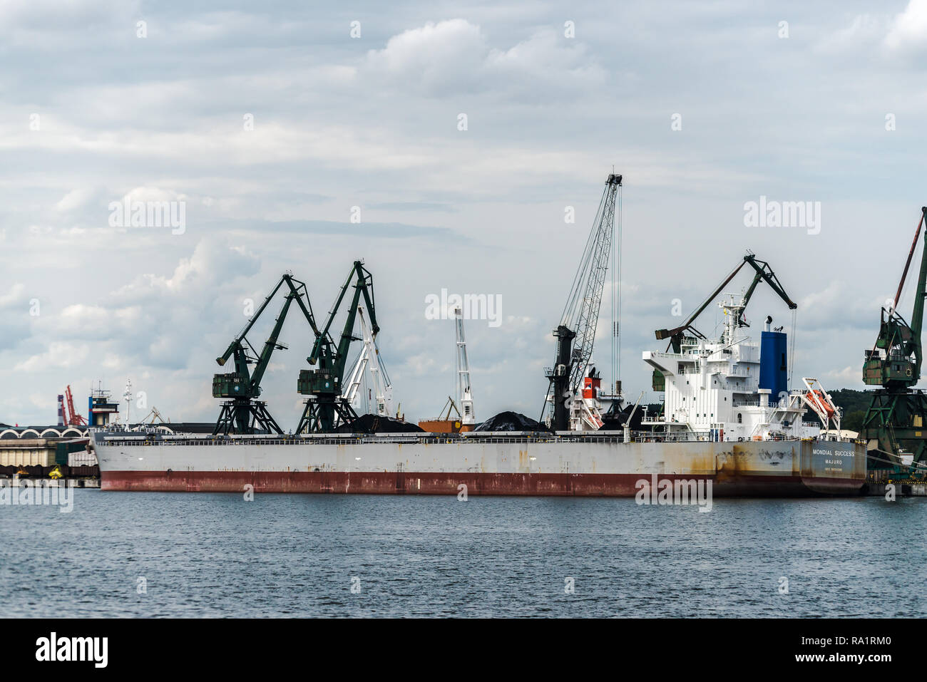 Gdynia, Poland. August 25, 2018: Views from excursion ship around  Gdynia Harbour. Cranes at wharf Stock Photo