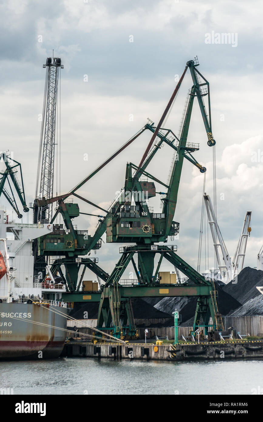 Gdynia, Poland. August 25, 2018: Views from excursion ship around  Gdynia Harbour. Cranes at wharf Stock Photo