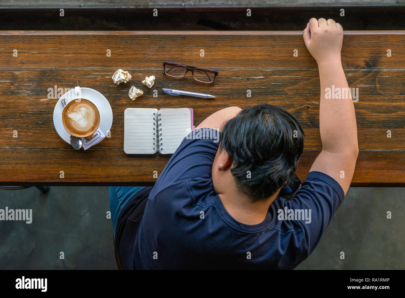 Asian marketing freelancer feeling tired and stressed Stock Photo