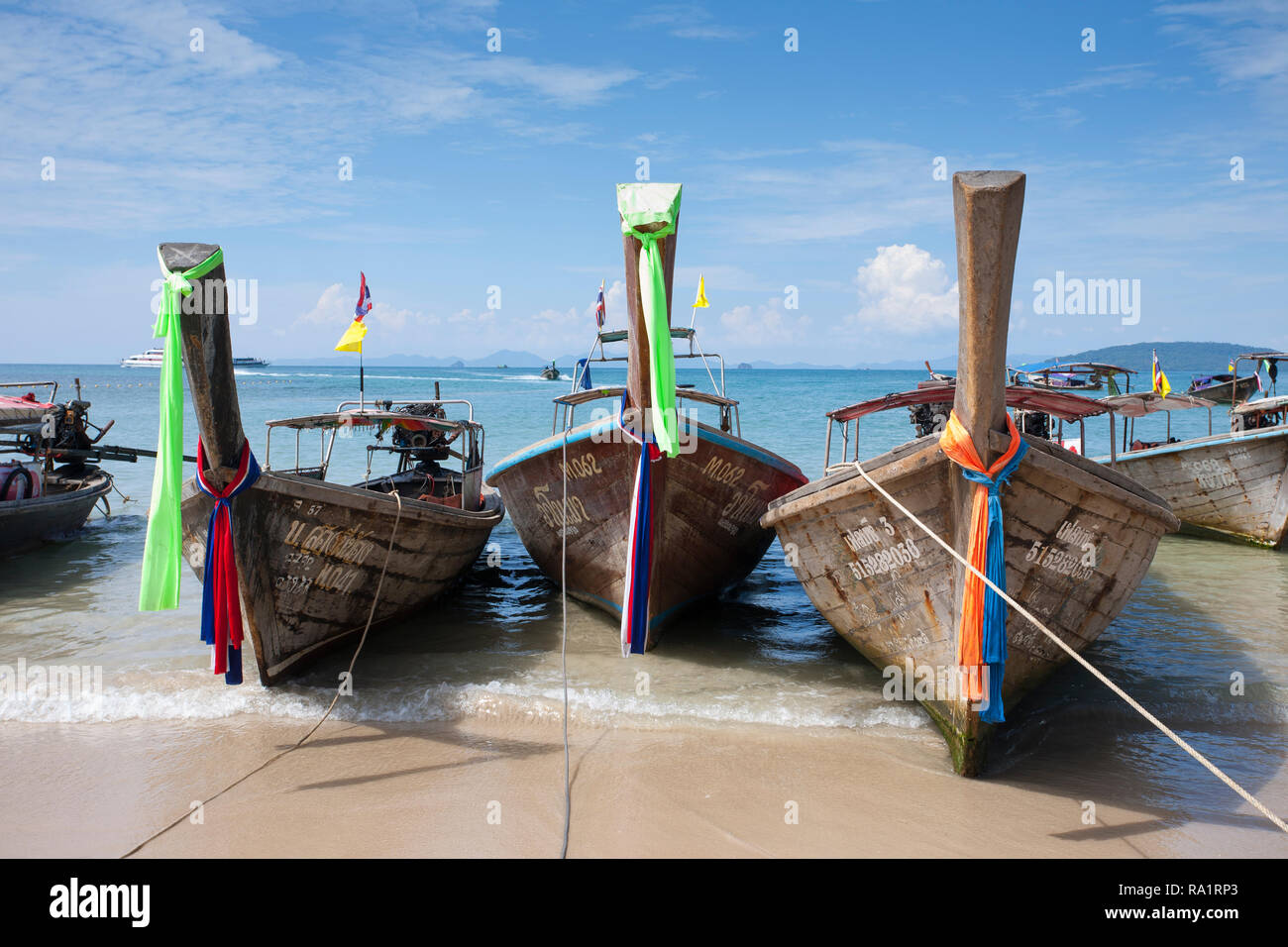 Colourful wooden fishing boat on the beach hi-res stock