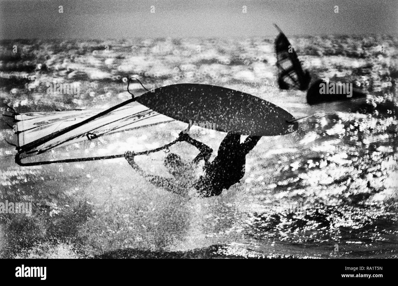1994: Nik Baker, British Windsurfing Champion and the best windsurfer Britain has ever produced sails into trouble during a World Windsurfing Association event at  Brighton. Stock Photo