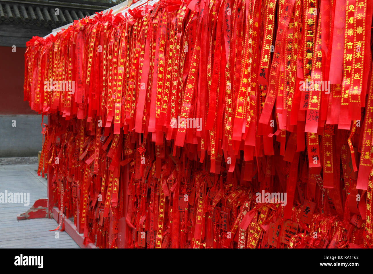 Red tassles at the summer palace Beijing China. Memories, dreams and prayers and good luck for the spirit world. Stock Photo