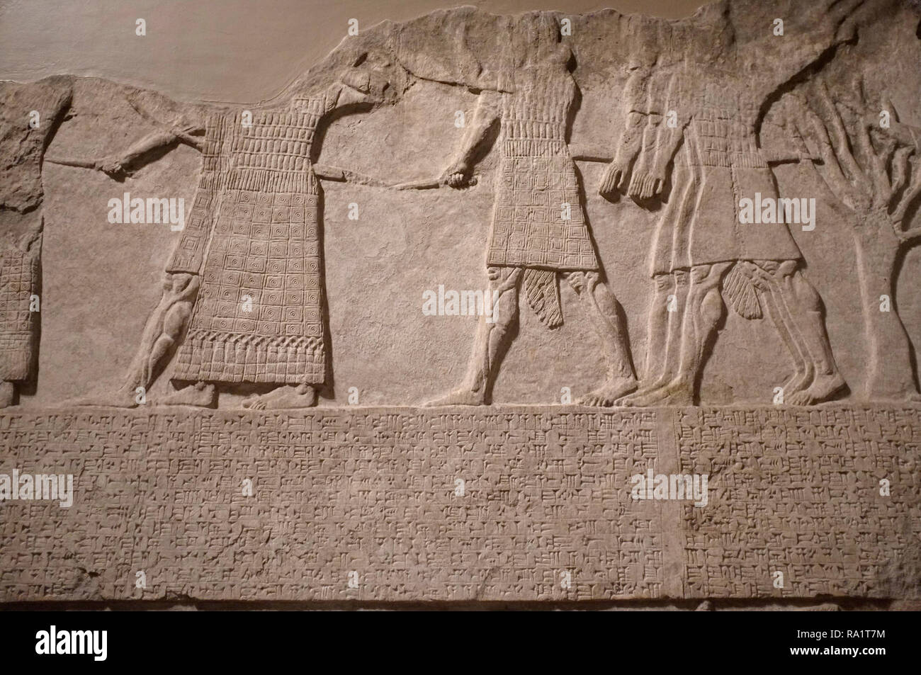Ancient Sumerian artefacts at the british museum, London, showing cuneiform text and writing from the ancient assyrian region now iraq. Stock Photo
