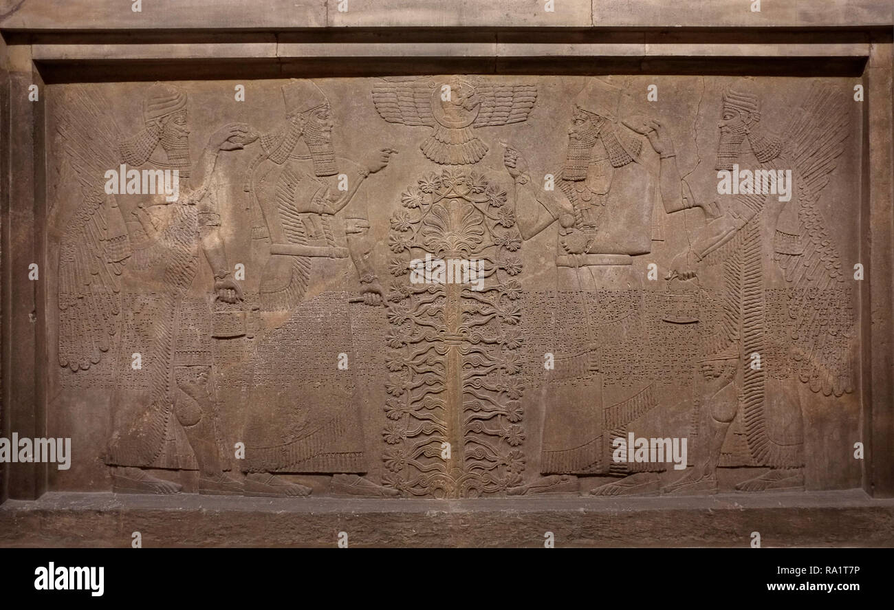 Neo-Assyrian Wall panel relief artefacts at the British Museum London, with cuneiform text, from Nimrud, the ancient Assyrian region now Northern Iraq Stock Photo