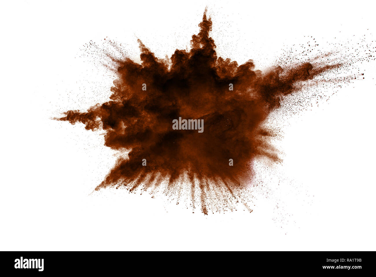 Freeze motion of brown dust explosion. Stopping the movement of brown powder. Explosive brown powder on white background. Dry soil splater on white ba Stock Photo