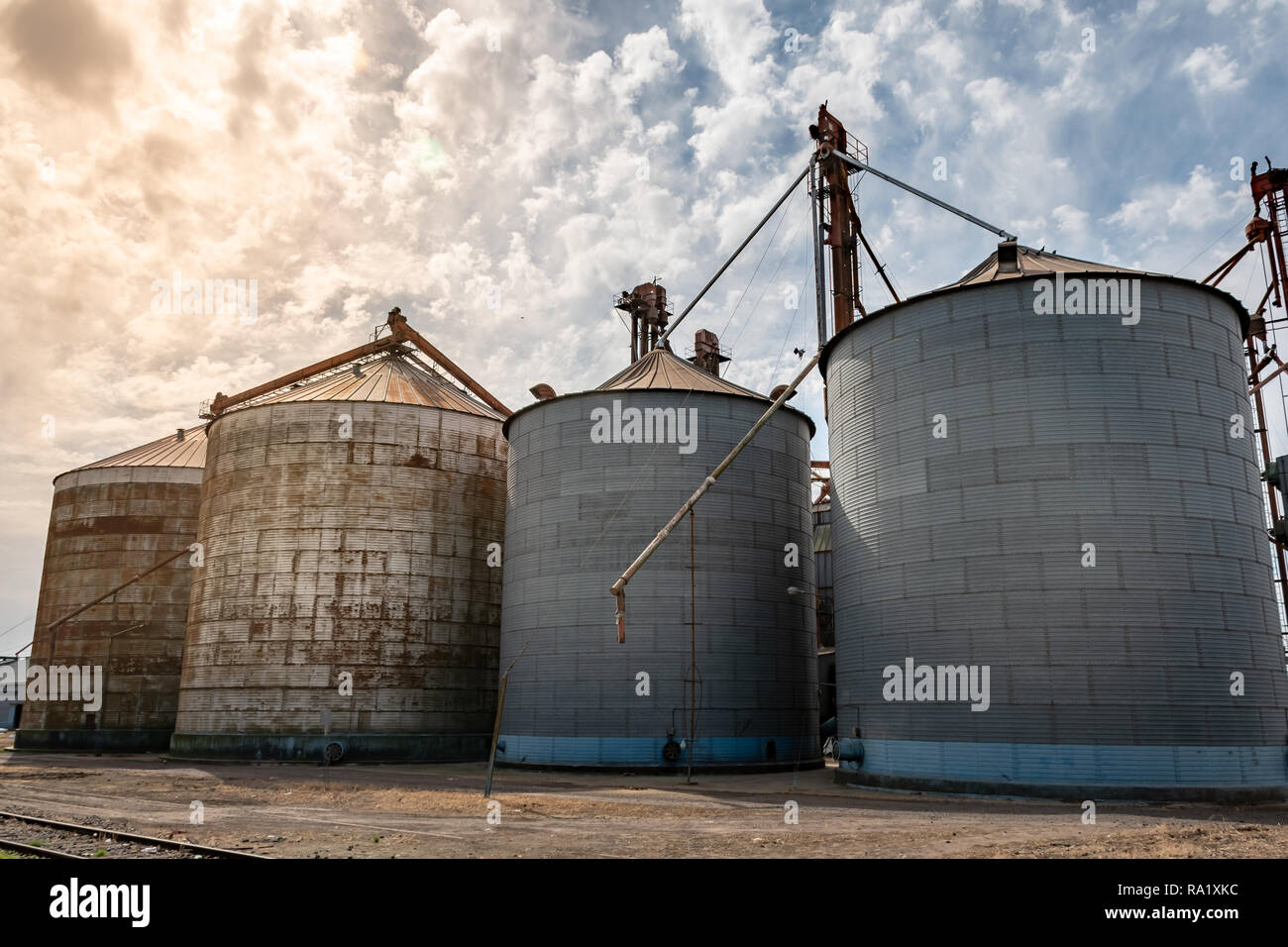 Three metal tanks for storage of grains. Silos for grain storage Stock