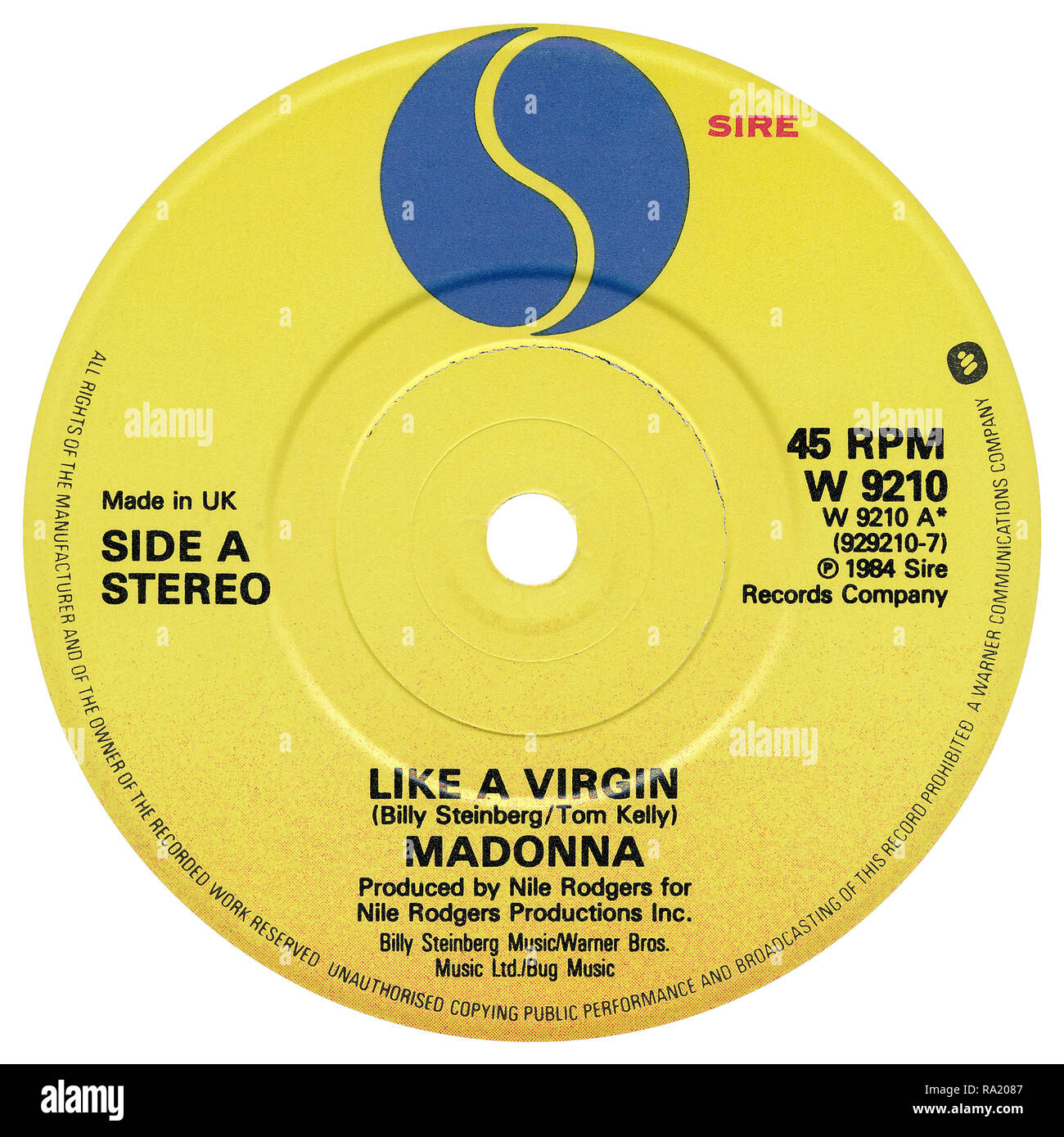 UK 45 rpm 7' single of Like A Virgin by Madonna on the Sire record label from 1984. Written by Billy Steinberg and Tom Kelly and produced by Nile Rodgers. Stock Photo