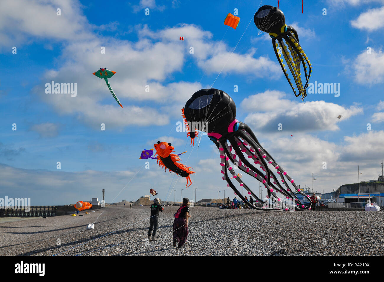 DIEPPE, FRANCE - SEPTEMBER 11, 2018: Kite festival. Octopus kites in the sky in Atlantic ocean Stock Photo