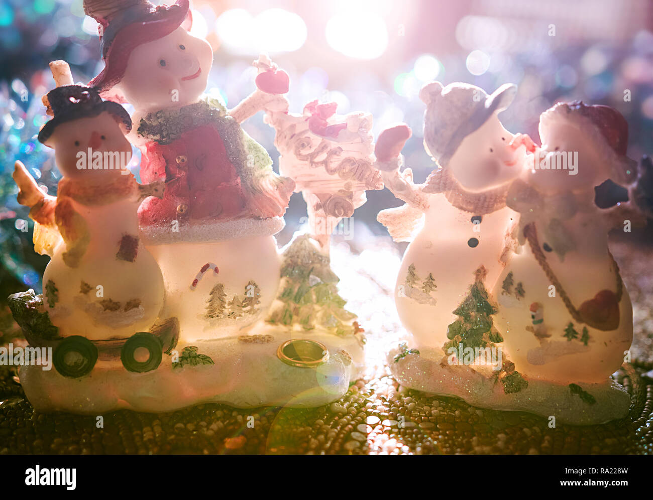 Christmas figurines, backlit by the morning sun. Stock Photo