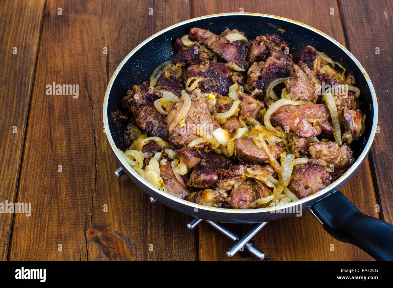 Frying pan with fried chicken giblets. Studio Photo Stock Photo Alamy