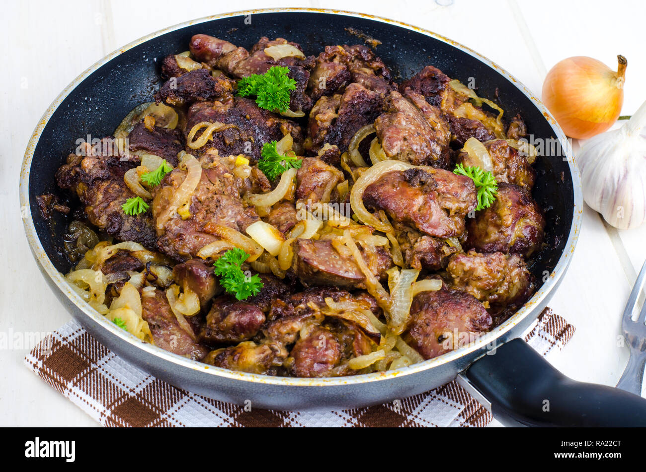 Frying pan with fried chicken giblets. Studio Photo Stock Photo Alamy