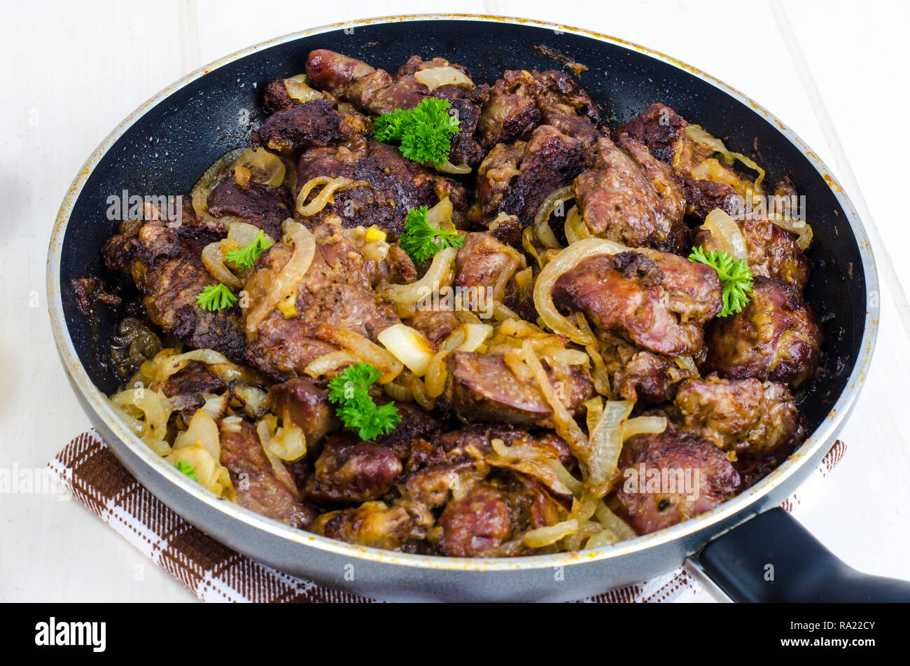 Frying pan with fried chicken giblets. Studio Photo Stock Photo Alamy