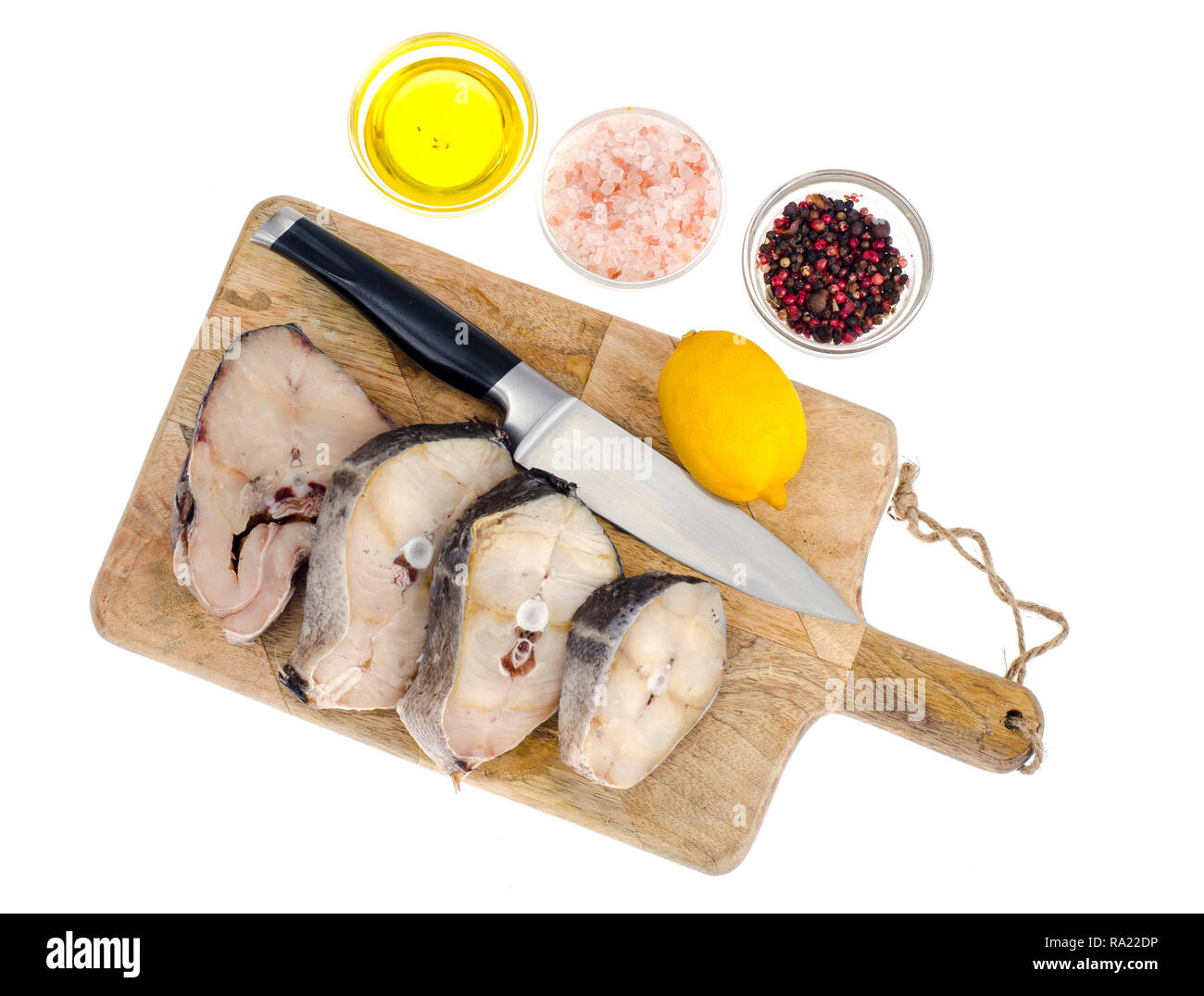 Frozen white fish steaks, cooking ingredients. Studio Photo Stock Photo