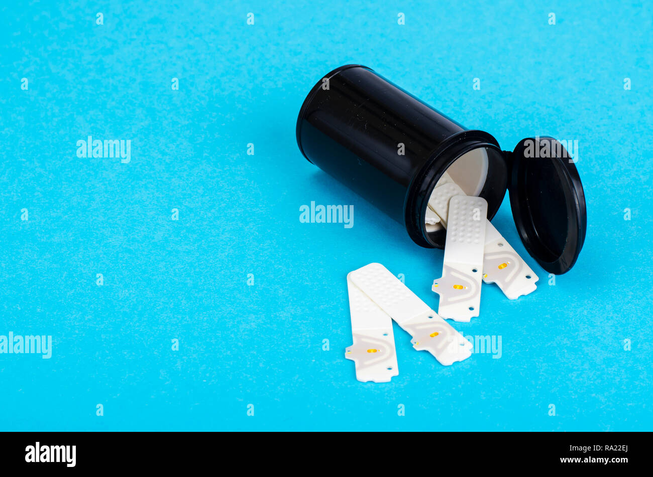 Blood test strips, diabetic control and diagnosis. Studio Photo Stock