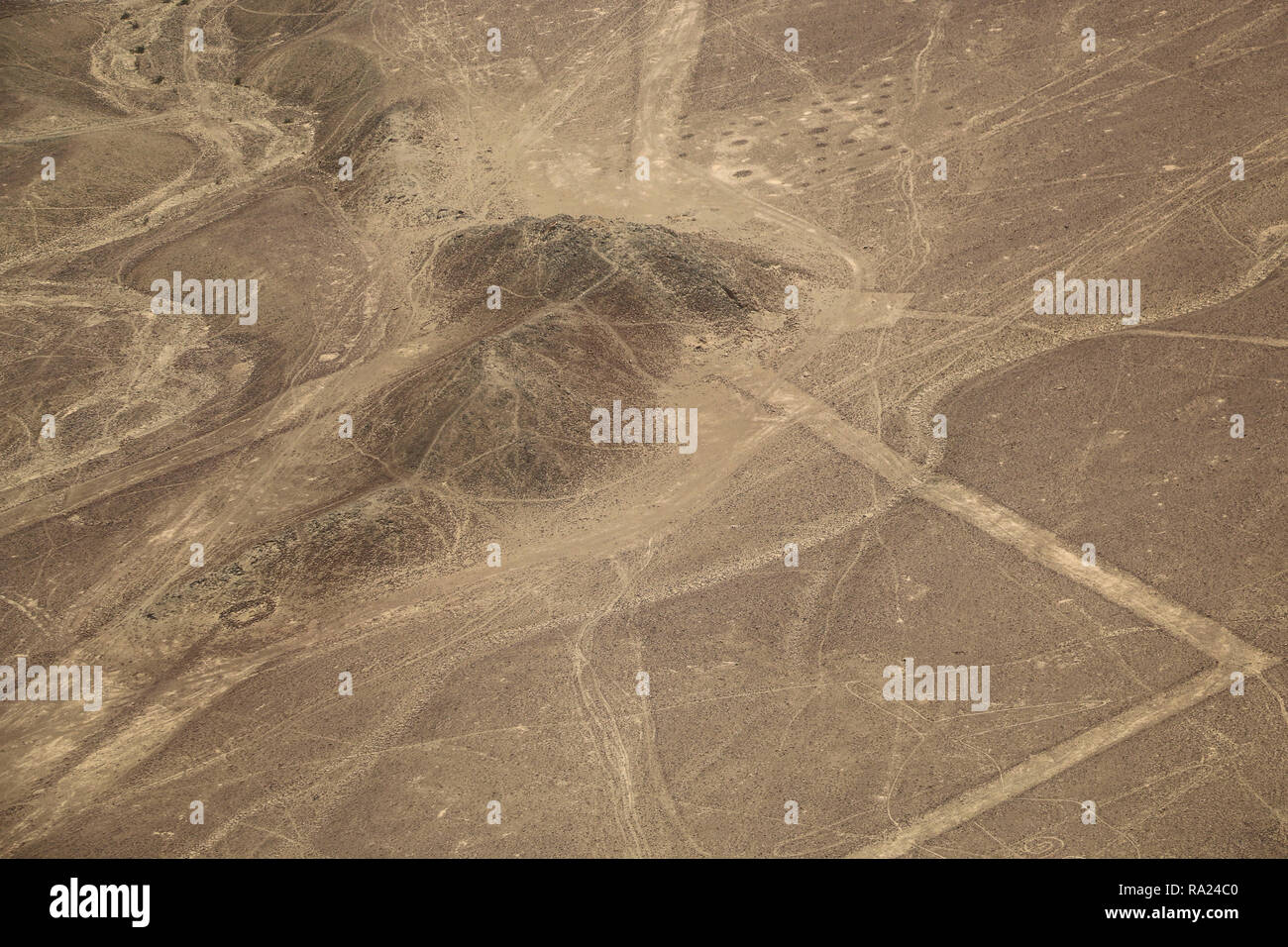 Nazca desert, Peru, hill and straight lines Stock Photo