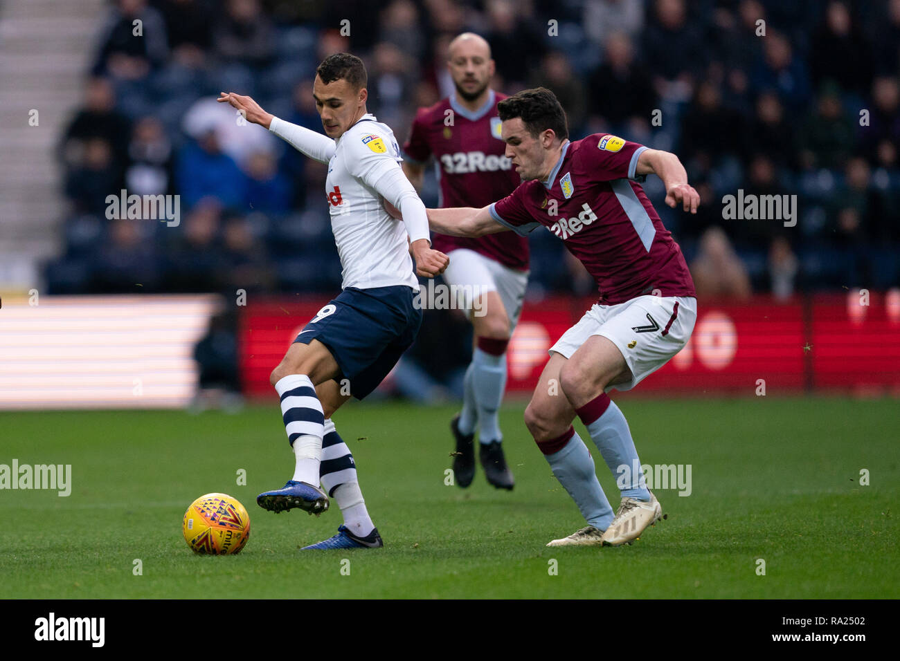 Preston North End's Graham Burke under pressure from Aston Villa's John McGinn  29th December 2018, Deepdale, Preston, England; Sky Bet Championship, Preston North End vs Aston Villa ;    Credit: Terry Donnelly/News Images  English Football League images are subject to DataCo Licence Stock Photo