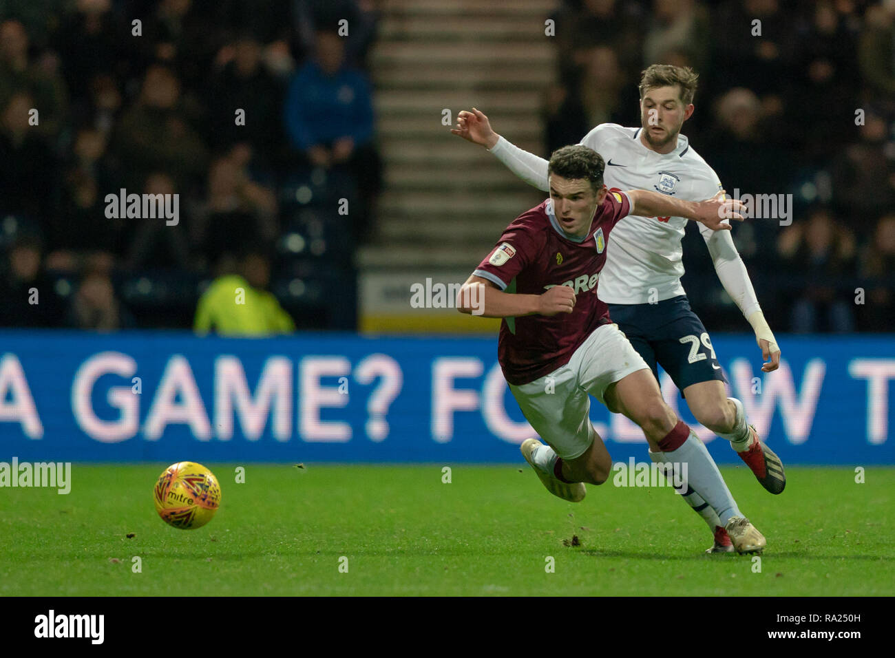 Aston Villa's John McGinn under pressure from Preston North End's Tom Barkhuizen  29th December 2018, Deepdale, Preston, England; Sky Bet Championship, Preston North End vs Aston Villa ;    Credit: Terry Donnelly/News Images  English Football League images are subject to DataCo Licence Stock Photo