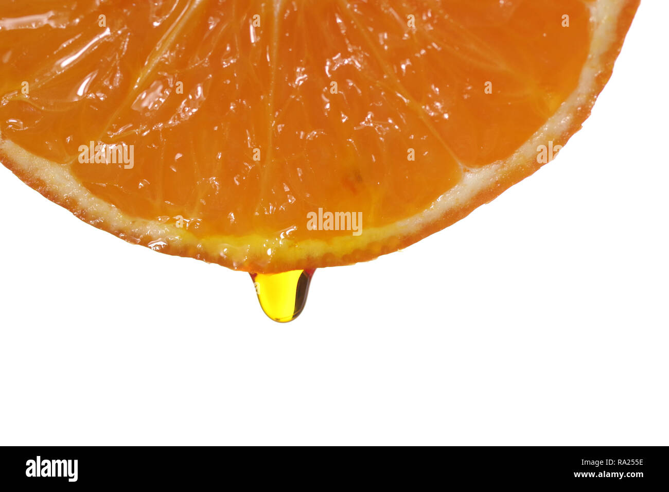 mandarin with dripping clear juice on white background Stock Photo
