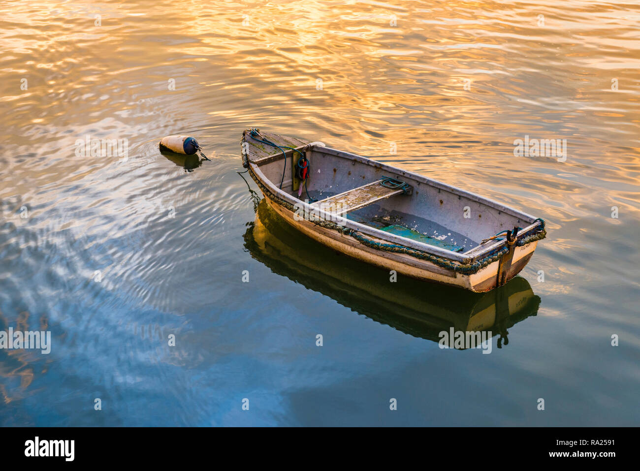 River Wear Fish Quay, fishing boat in foreground, sunset producing a stunning array of colours & reflections Stock Photo