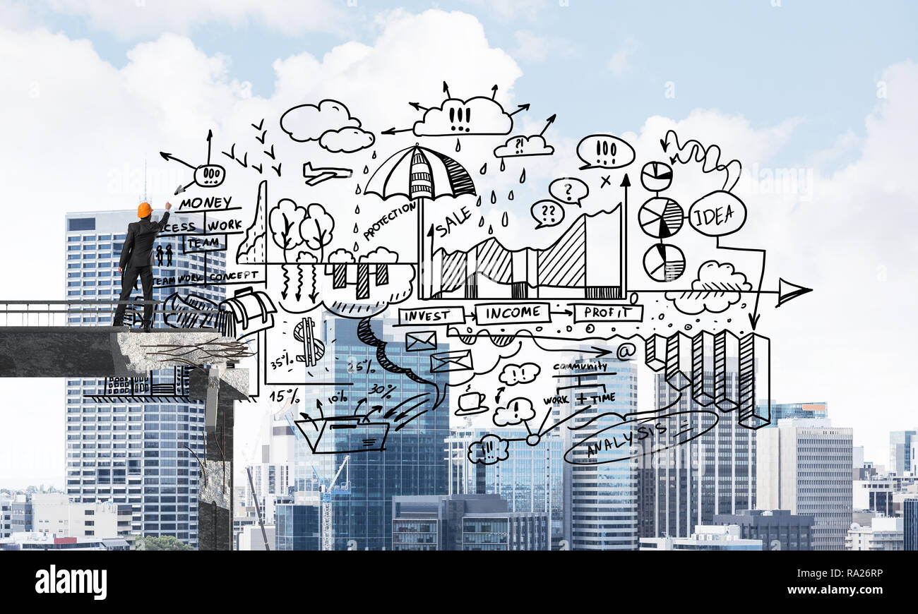 Businessman drawing business conceptual sketches Stock Photo - Alamy