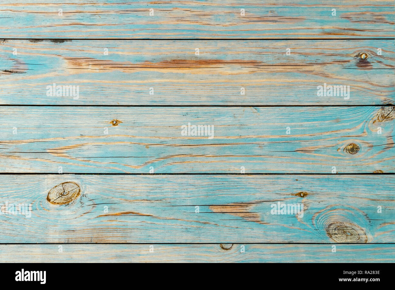 Blue wooden background. Blue faded painted wooden texture, background, wallpaper. Wooden background, painted surface blue boards. Antique texture for  Stock Photo