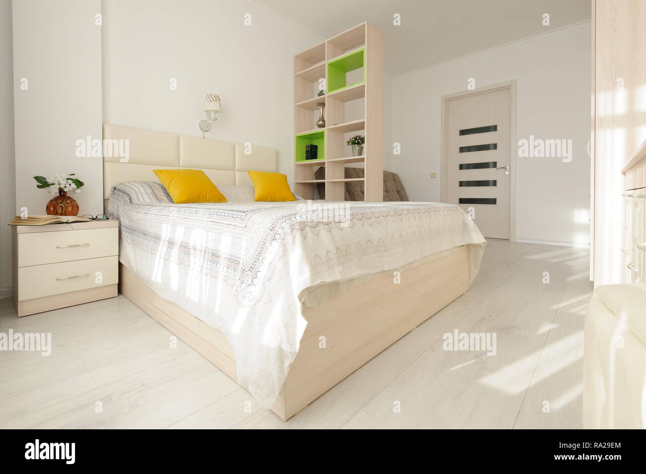 Bedroom interior with large double bed Stock Photo Alamy