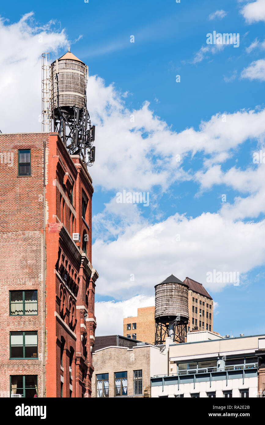 Low angle view of water tanks in Tribeca North District of New York