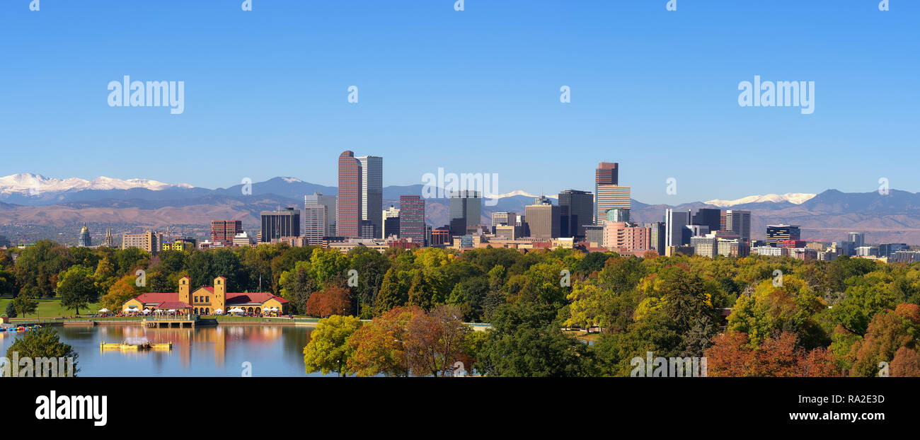 Skyline of Denver downtown with Rocky Mountains Stock Photo