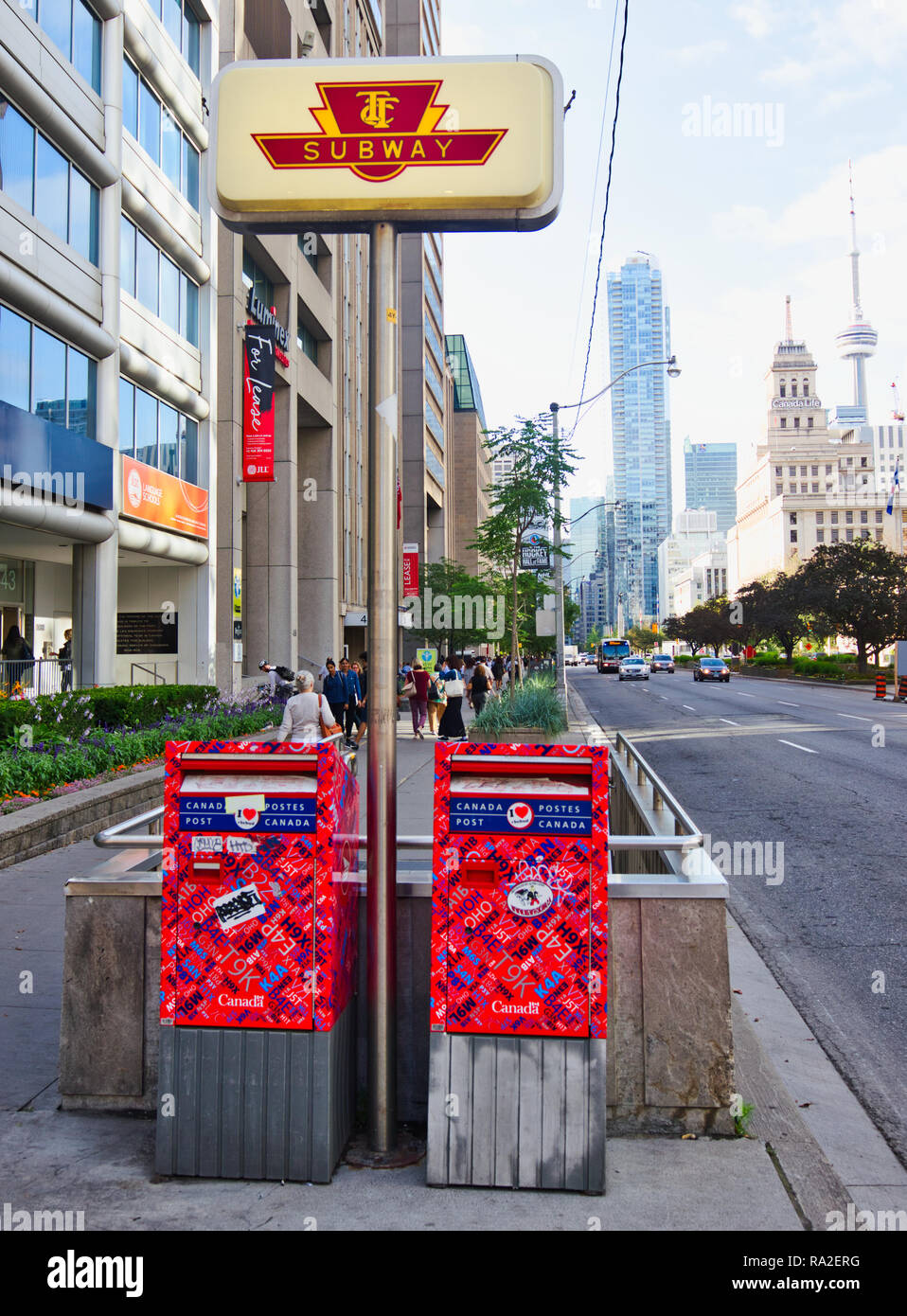 Toronto subway sign and Canada Post ( Postes Canada) postboxes, Toronto, Ontario, Canada Stock Photo