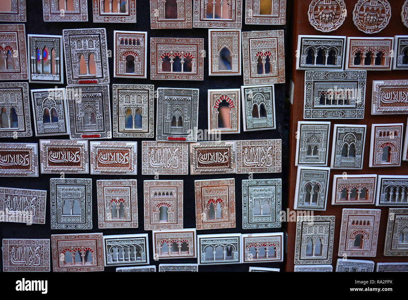 Alhambra souvenir fridge magnets on sale in Granada, Spain. Stock Photo