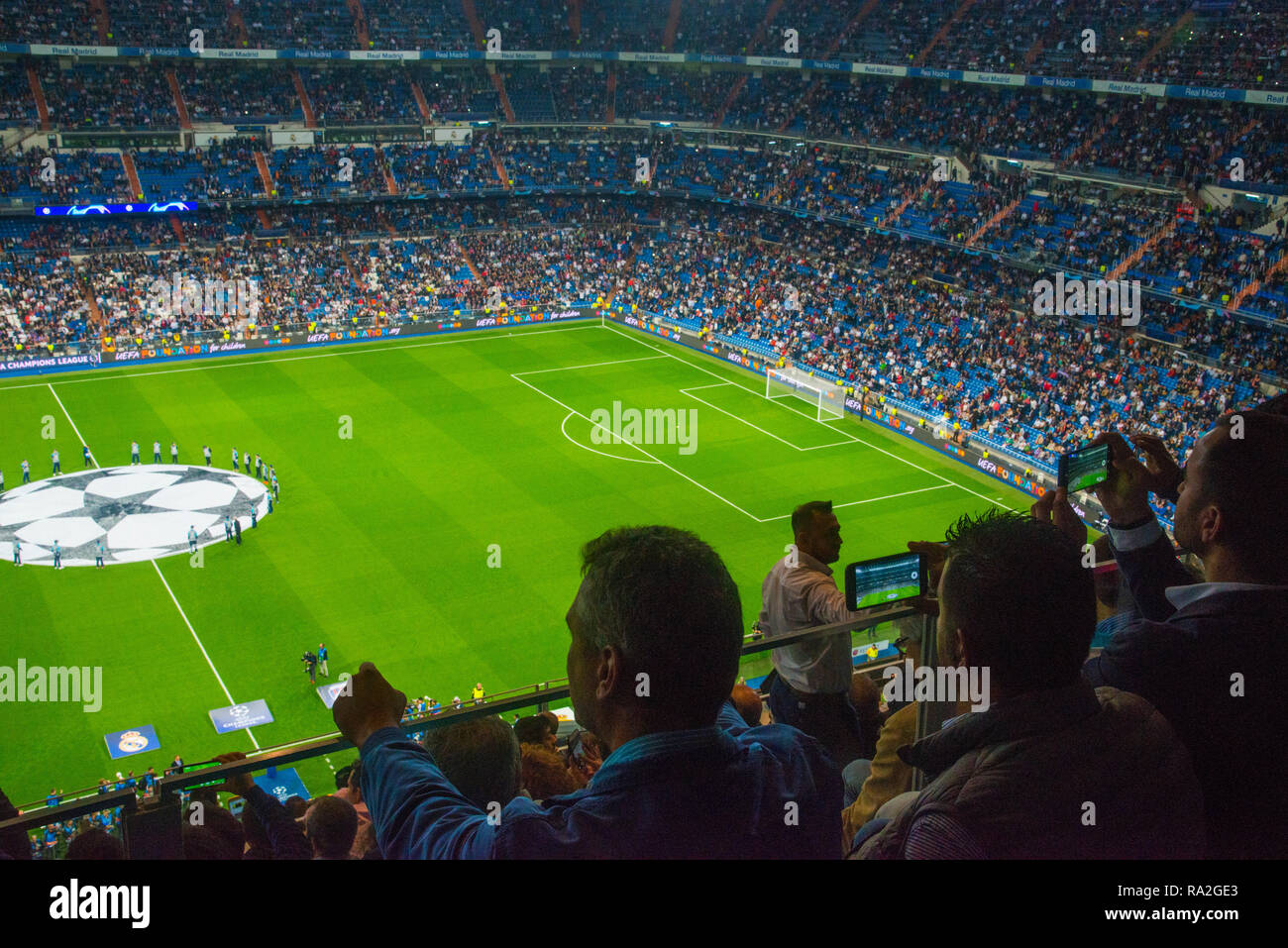Spectators before a Champions League football match. Santiago Bernabeu stadium, Madrid, Spain. Stock Photo
