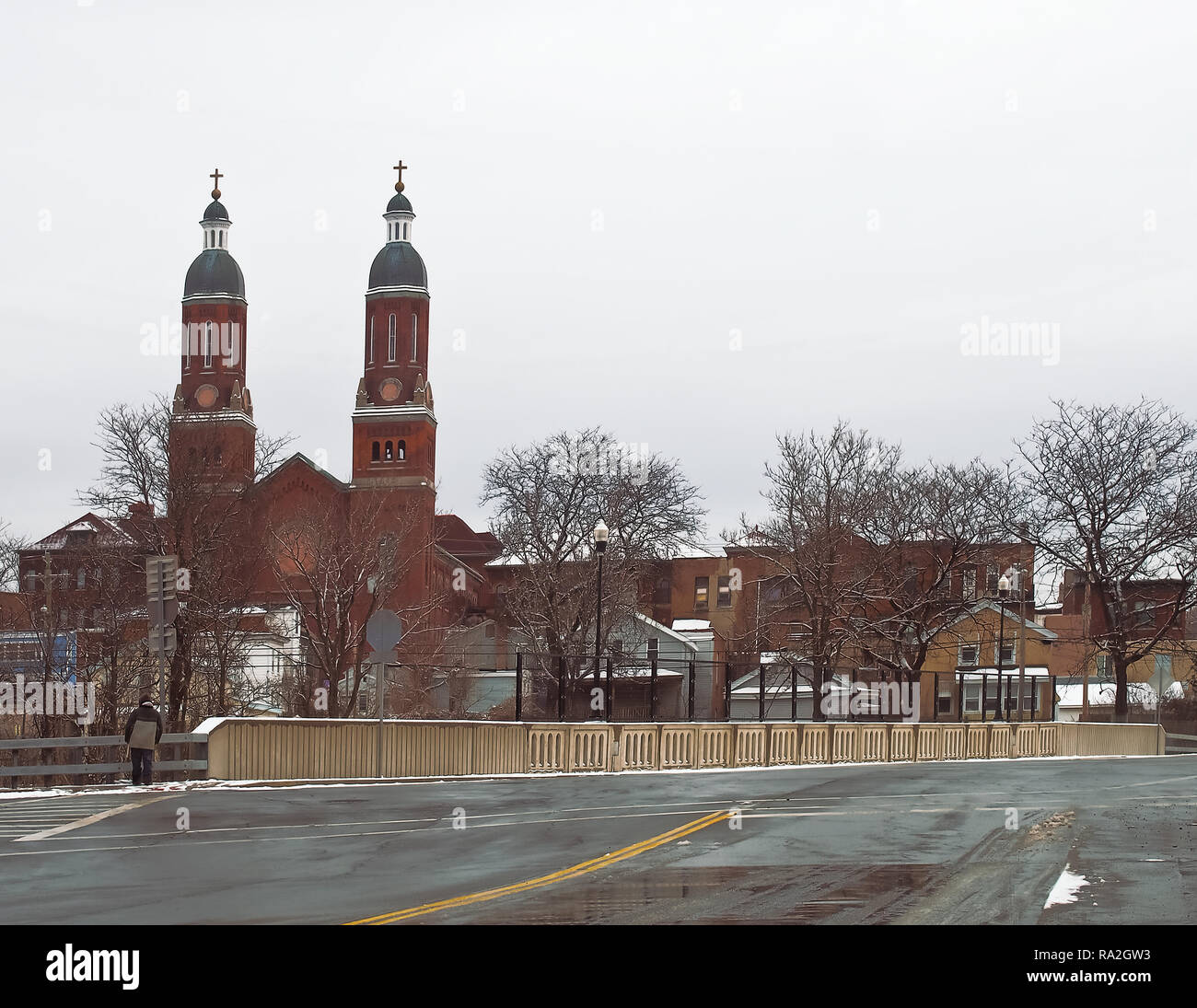 Syracuse, New York, USA. December 30, 2018. Catawba Street on Syracuse's north side with Assumption Church and the Little Italy neighborhood  on a win Stock Photo