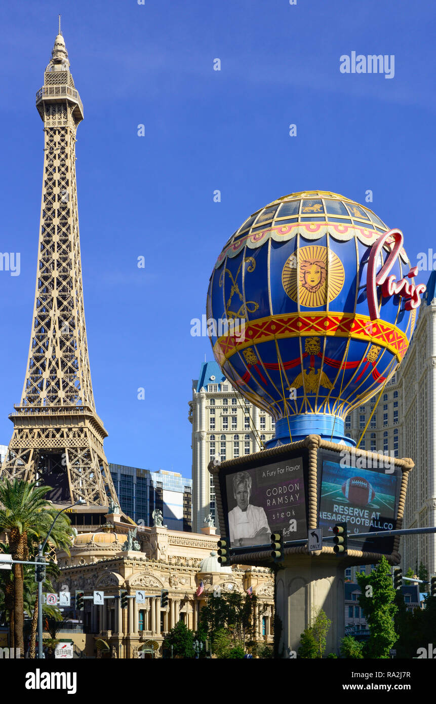View of the Paris Las Vegas Hotel and Casino on the Las Vegas Strip with the replicas of the Eiffel tower and the Vintage Hot Air Balloon in NV Stock Photo