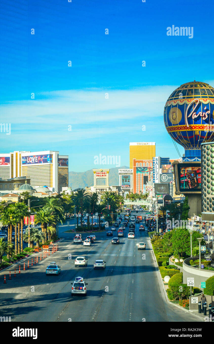 Elevated view of traffic on the Las Vegas Strip with numerous hotels and casinos and  palm trees lining the famous drive in Las Vegas, NV Stock Photo