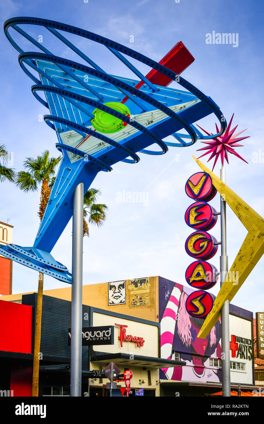 Huge neon martini glass with olive surrounded by other vintage Vegas signs and attractions in the Fremont Street East District in downtown Las Vegas,  Stock Photo