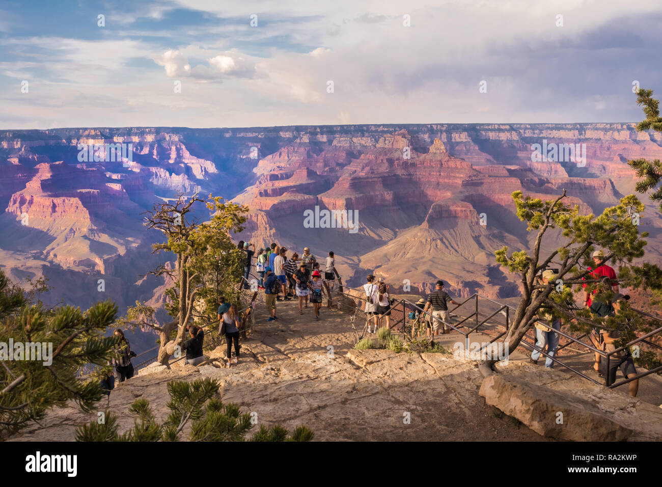 Large number of people enjoying beautiful view or rock formations of the Grand Canyon Stock Photo