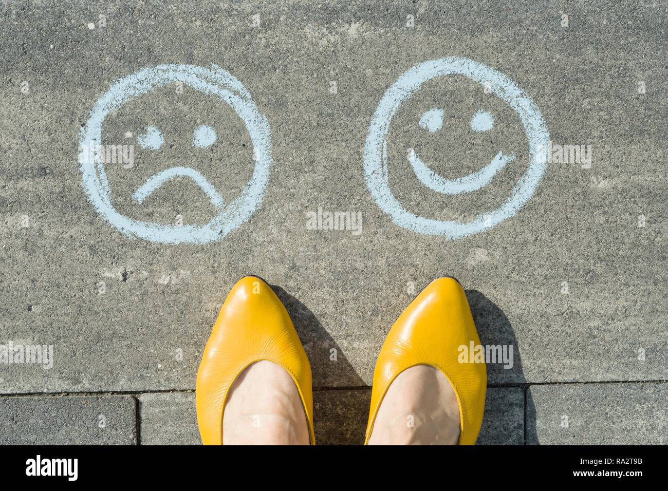 Happy sad woman balance hi-res stock photography and images - Alamy