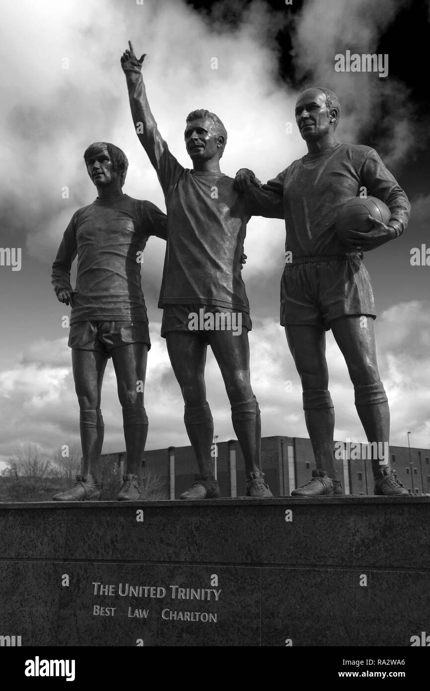 The United Trinity sculptor by Philip Jackson, Manchester United's 'Old Trafford' ground, Manchester, England, UK Stock Photo