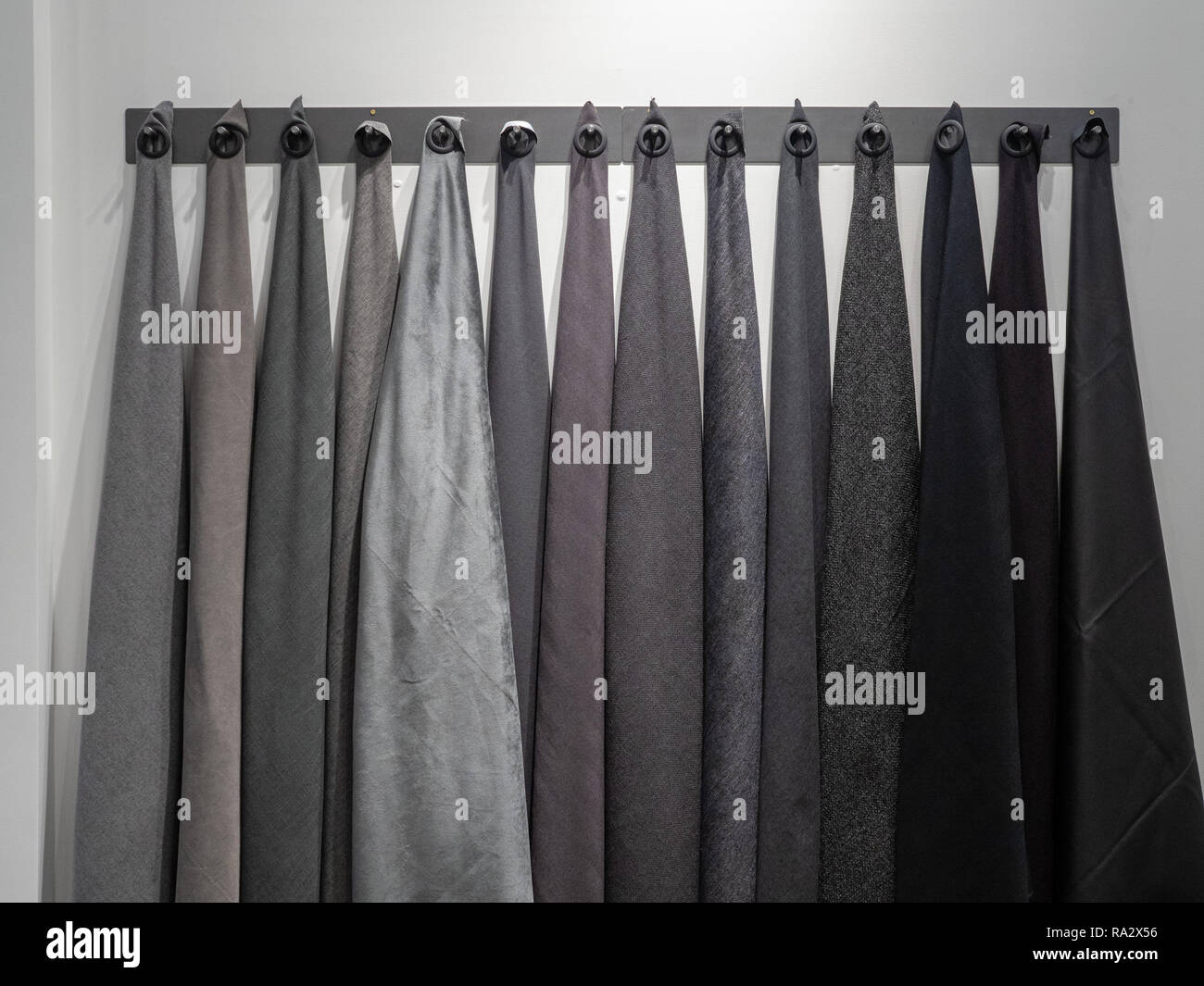 Wall rack with dark shades of gray and black materials of sample